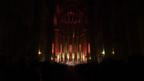 majestic glowing scene of santa maria del mar in barcelona during concert, dolly forward