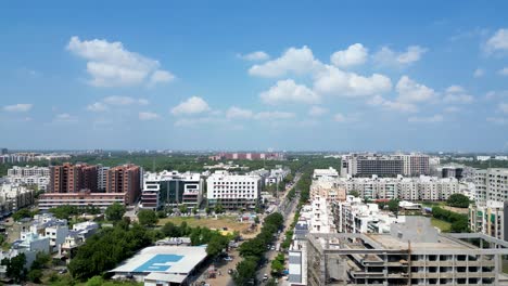 high rise building in india, apartment, flats, business, office space, drone shot with blue sky, gandhinagar, gujarat, india