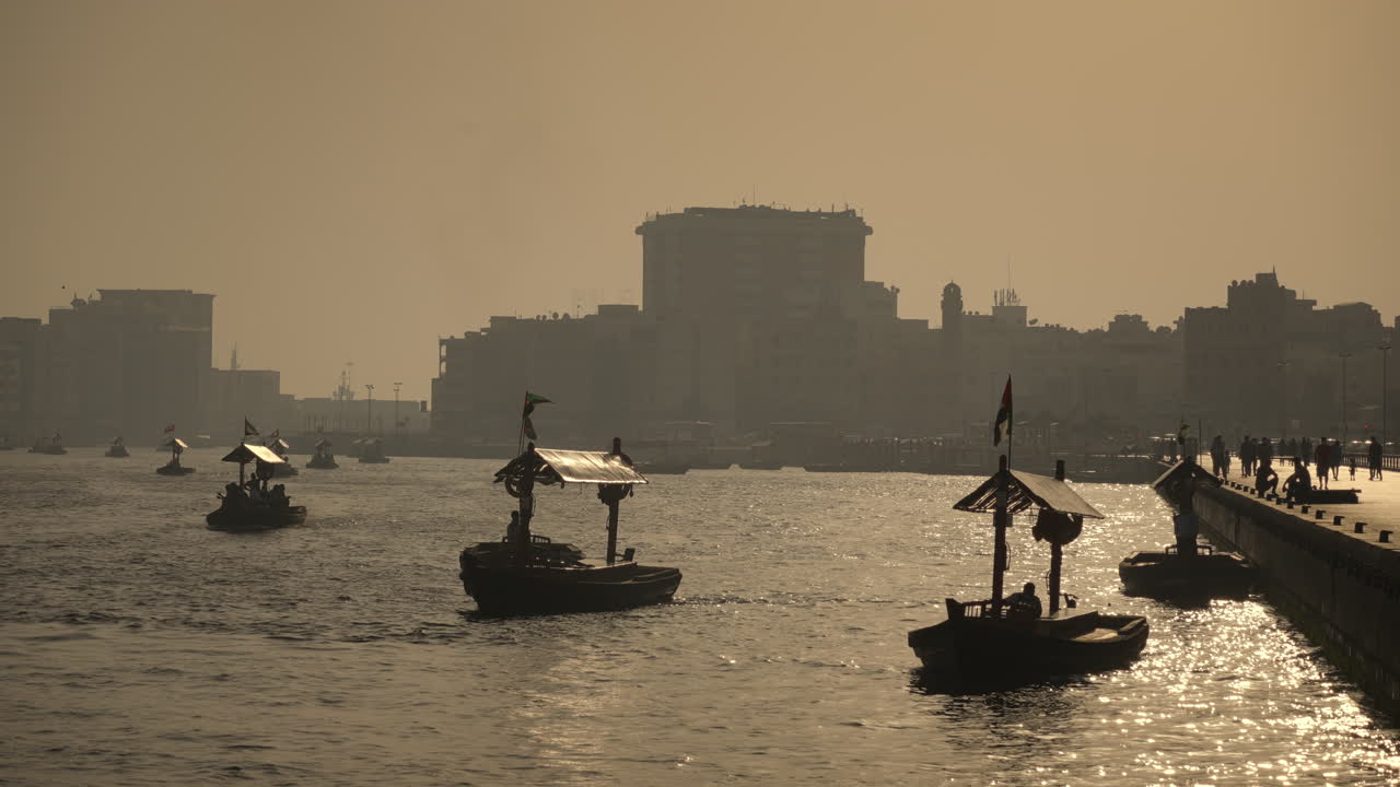 Traditional Boats on a Canal in Dubai at Sunset