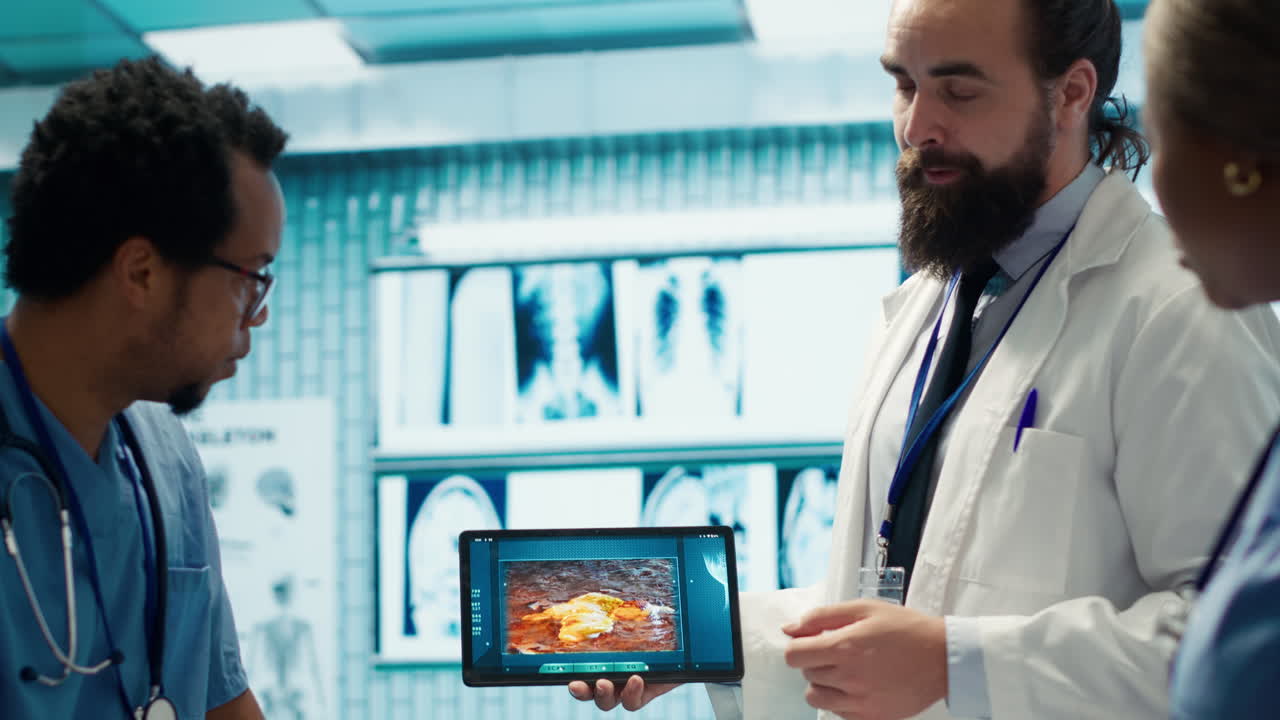 Medical Professionals Reviewing Imaging on Tablet