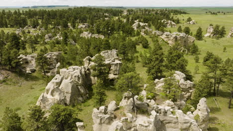 aerial view of unique rock formations and prairie landscape