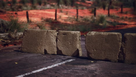 old rusted concrete road barrier blocks