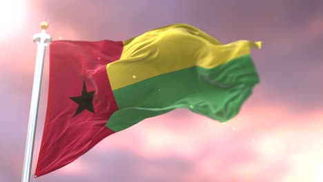 flag of guinea bissau waving at wind in slow at sunset, loop