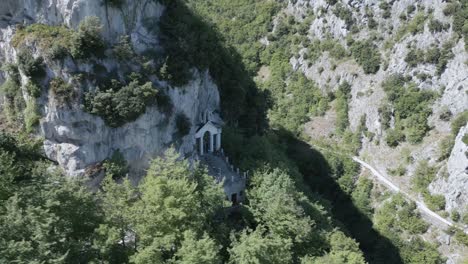 Drone-footage-at-"Santuario-Madonna-della-Grotta"-a-baeutiful-little-church-built-inside-the-mountain