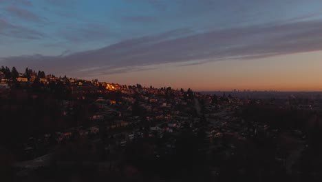 Aerial-Panoramic-View-of-a-modern-city-during-a-colorful-and-cloudy-sunset