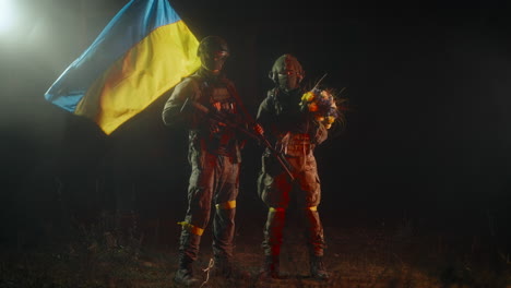ukrainian soldiers with flag and flowers