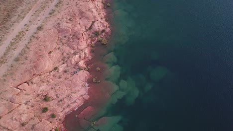 sand hollow state park, utah usa. aerial view or red rock coastline and water reservoir, birdseye