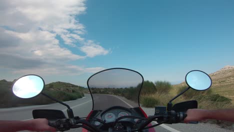 riding a motorcycle on penteli mountain in greece