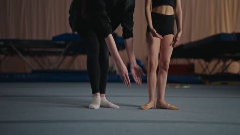 gymnast training with a coach