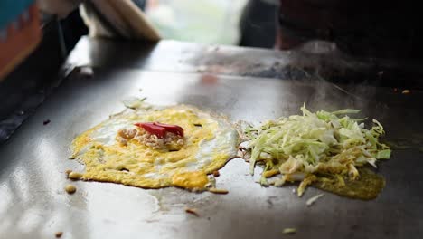 cooking food on a hot griddle