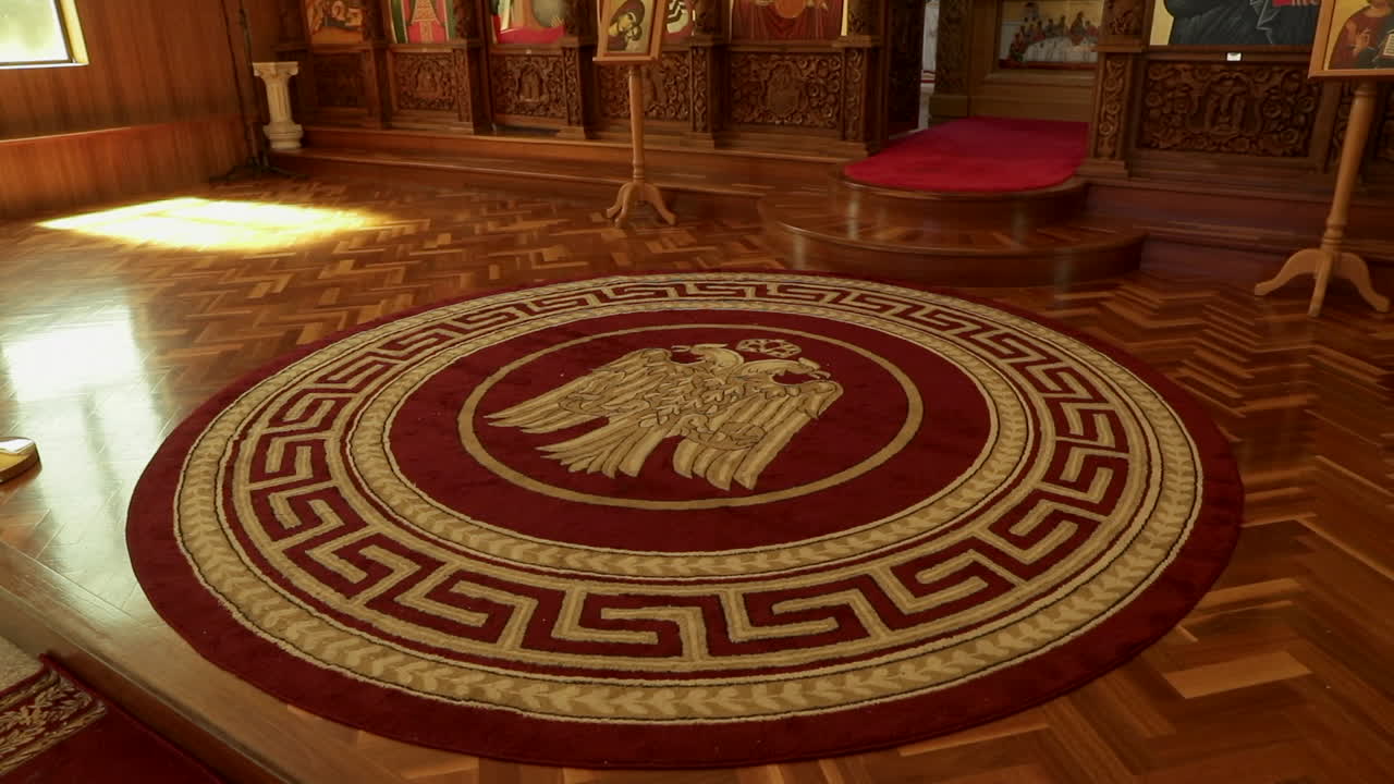 Close up to details on the floor in front of the altar of an orthodox church