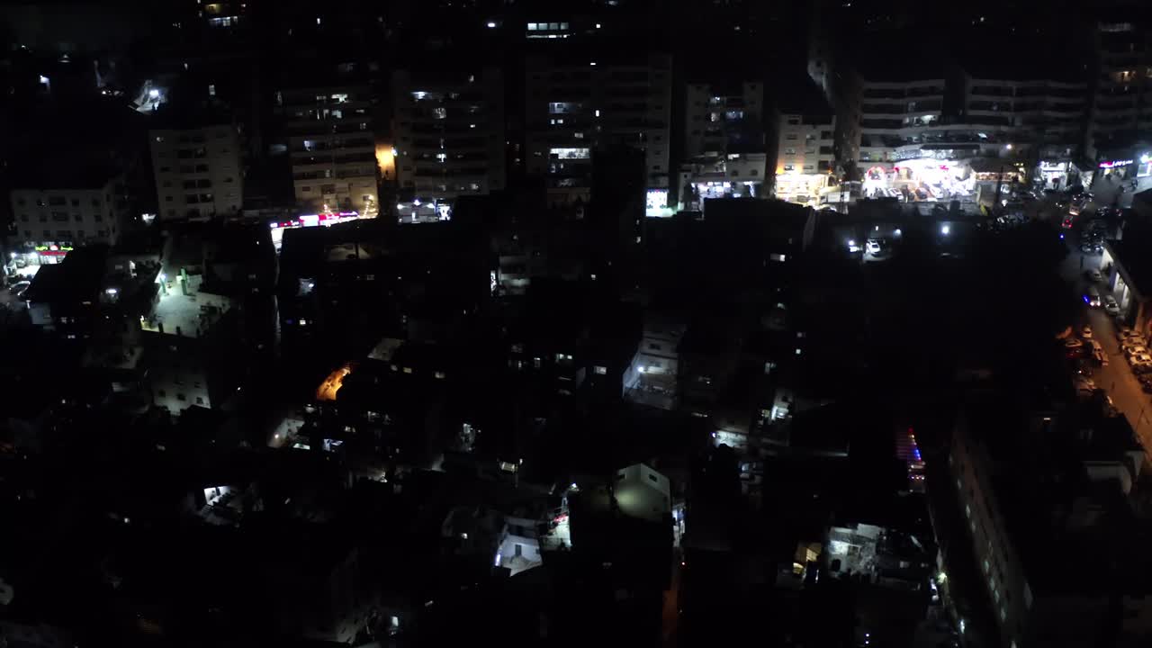 ciudad palestina por la noche vista aérea