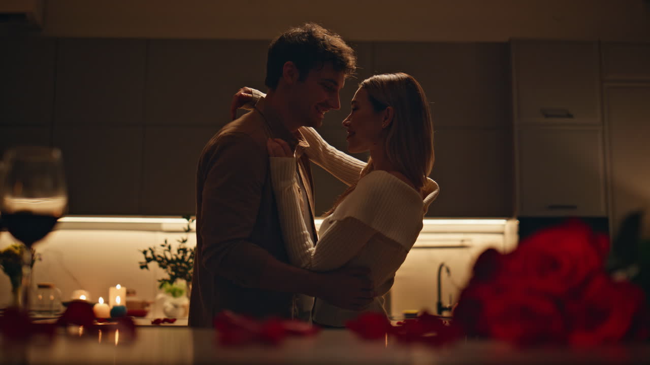 Romantic spouses dancing kitchen feeling closeness close up. Couple evening date