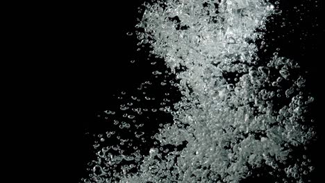 fizzy bubbles dispersing in the water