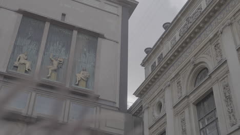august bournonvilles passage shot of statues in copenhagen denmark on a cloudy day log