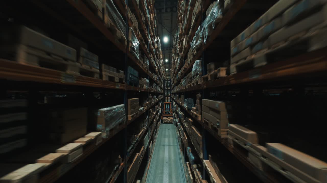 Immersive FPV drone footage capturing the vastness of a modern warehouse.Flying swiftly through towering shelves stocked with goods.