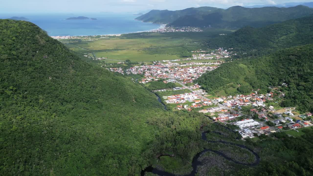 Santa Catarina Island Florian&oacute;polis Brazil scenic landscape on south part of the island with mountains view and village aerial footage drone