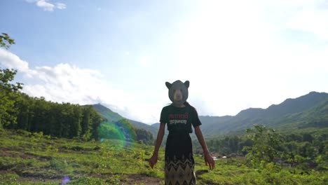 girl pose with bear mask