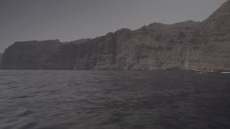 los gigantes coast cliffs in tenerife canary island from a speed boat. spain