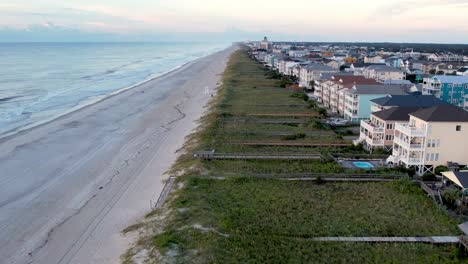 Aerial-over-the-dunes-and-sea-oats-at-carolina-beach-nc,-north-carolina