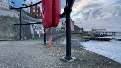 time lapse of cromer pier in norfolk, uk at sunset with a high tide.