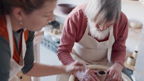 hands, pottery and clay with a man student