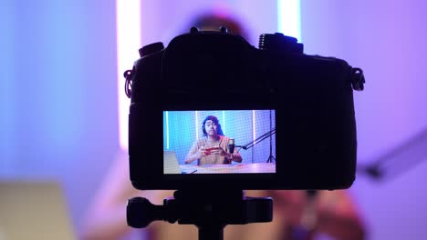 Display Camera Of Asian Man Playing Video Game With Mobile Phone Then Pose And Smiles To Camera While Live Stream