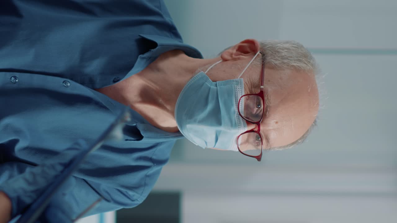 Elder patient attending checkup examination with nurse