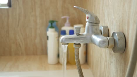 running water from a bathroom faucet