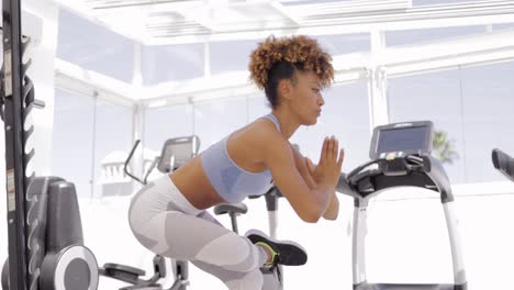 sporty girl in yoga position