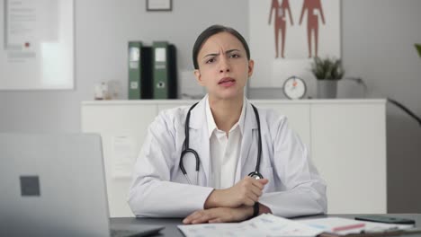 angry indian female doctor shouting on the patient