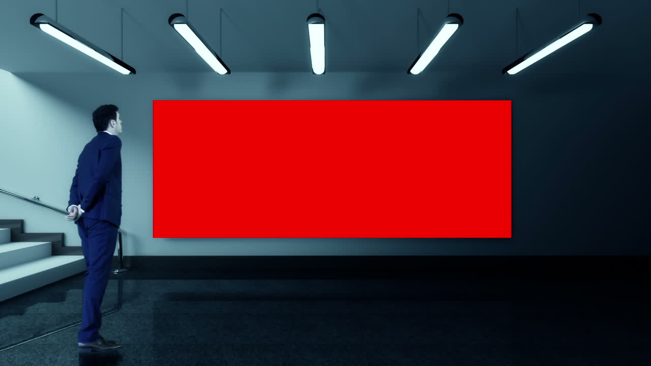Businessman looking at red screen