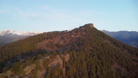 Aerial-sunrise-view-of-Eagle-Cliff-Mountain,-Rocky-Mountains,-Estes-Park,-Colorado