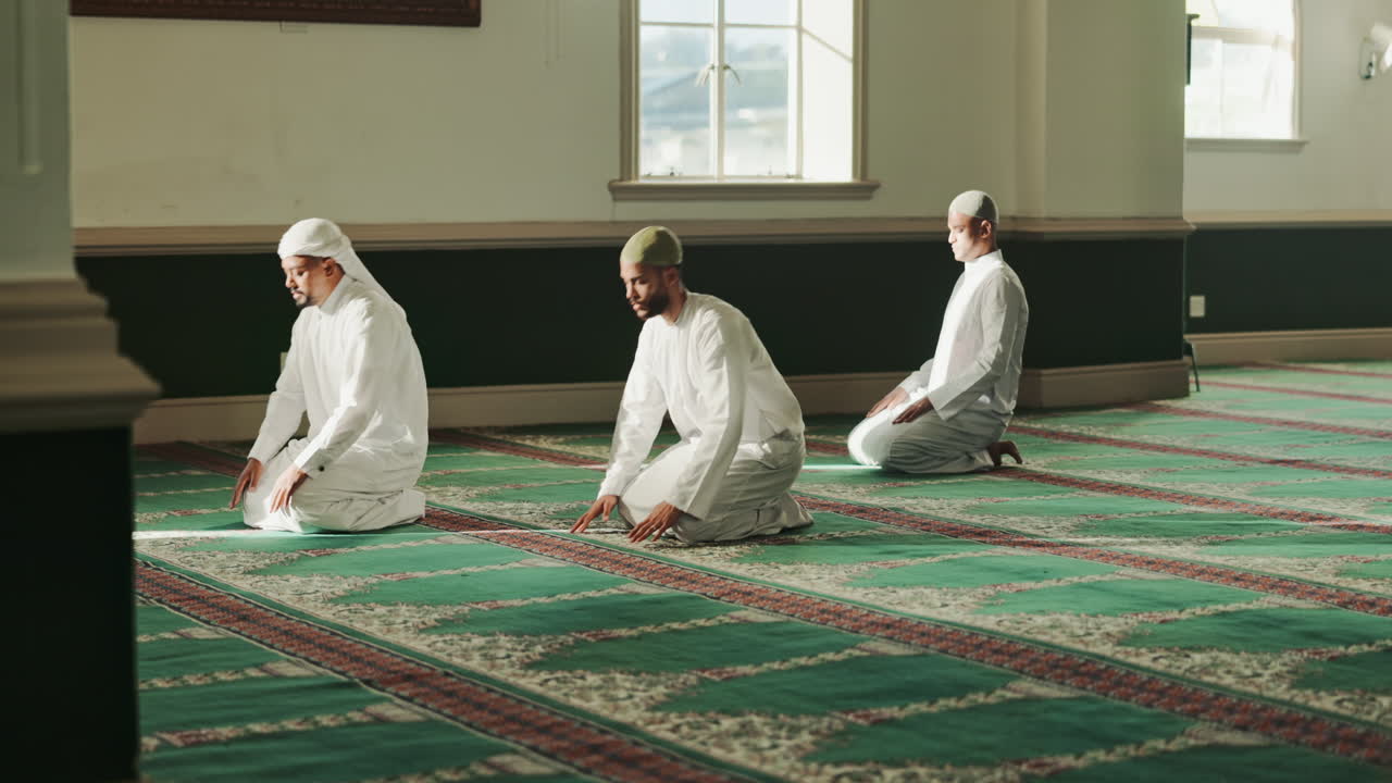 Muslim men praying in a mosque