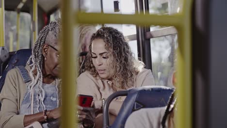 diverse passengers using smartphones on public transport