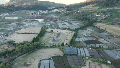 Arjuna-temple-from-afar-in-Dieng-Regency-region,-Indonesia,-Aerial-view