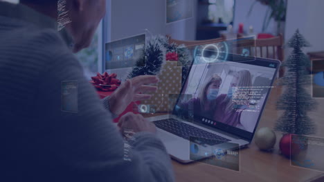 video chatting with family on laptop, person surrounded by holiday animation