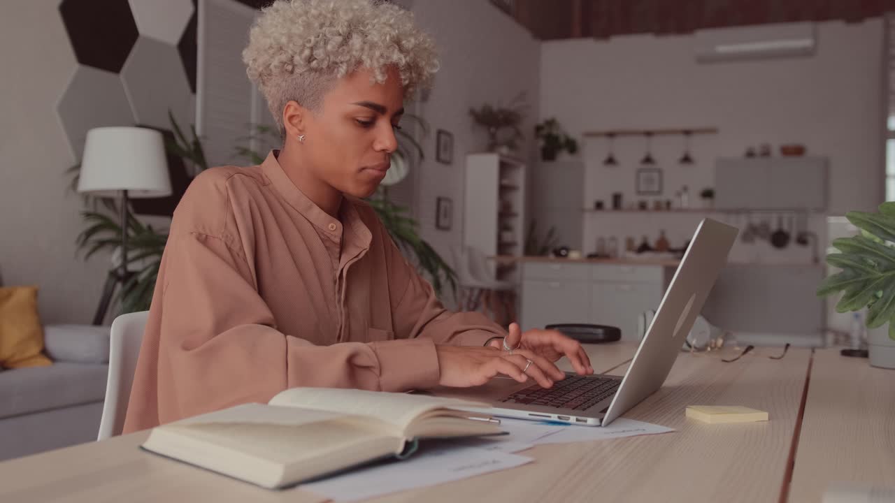 Serious girl study online with internet teacher learn language looking at laptop