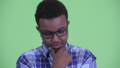 young african hipster man with afro hair wearing eyeglasses