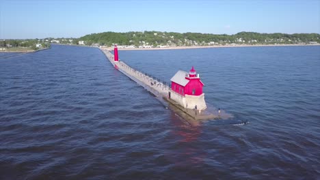 Drone-shot-of-a-lighthouse-in-Grand-Haven,-Michigan