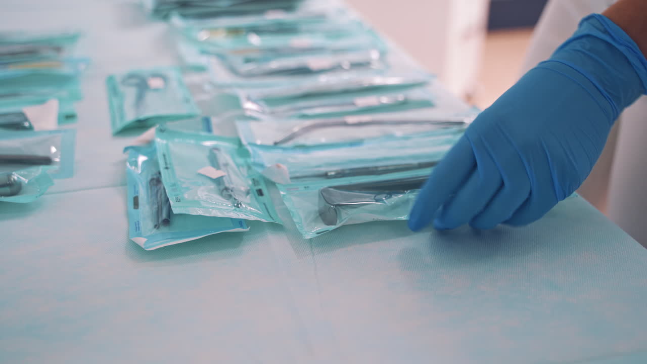 Set of dentist tools. Close up view of dentist starts to examine a patient