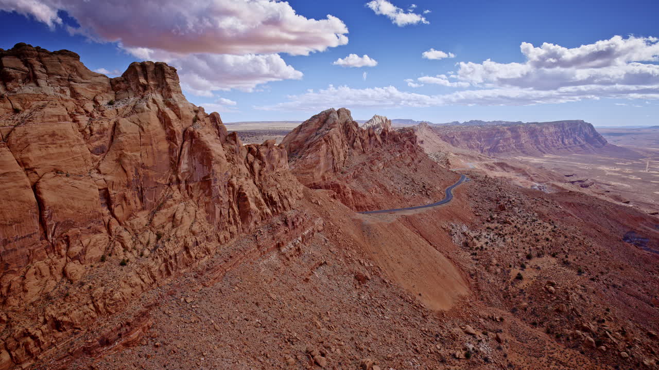 Majestic drone shot showcasing the steep and sudden elevation shift along the mountain ridge near Antelope Pass Vista.