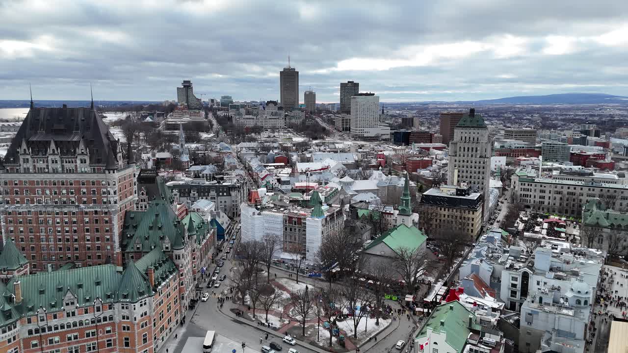 Experience the charm of Montreal's snowy cityscape, featuring historic buildings and modern skyscrapers under a cloudy sky, Chateau Frontenac, Quebec, Canada