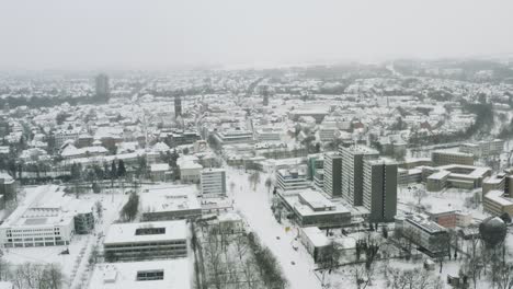 drone aerial views of the student town göttingen during winter 2021 in heavy snowfall