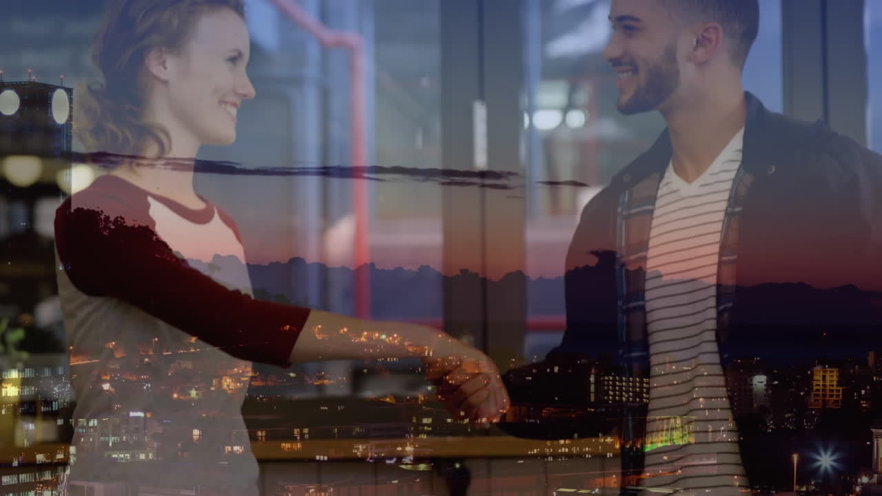 밤의 도시 풍경을 배경으로 손을 흔들고 있는 남녀의 디지털 구성