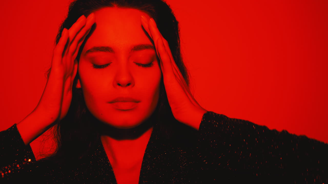 Woman in Red Light Portrait