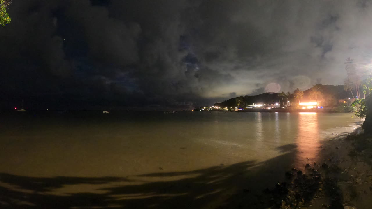 Moon Rise on Bay in Hawaii with jets flying by.