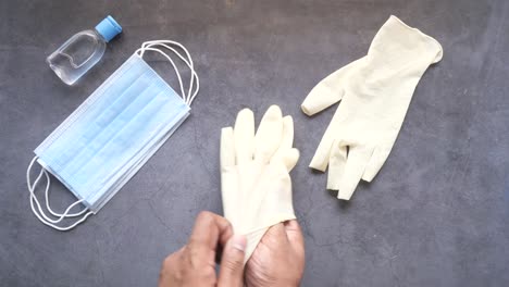 protective measures: gloves, masks, and hand sanitizer