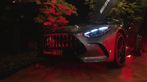 slow walk around luxurious car parked at motor show event, czechia