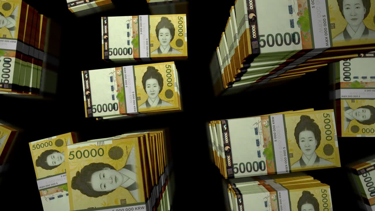 韓国ウォン紙幣の束の上を飛行するループアニメーション